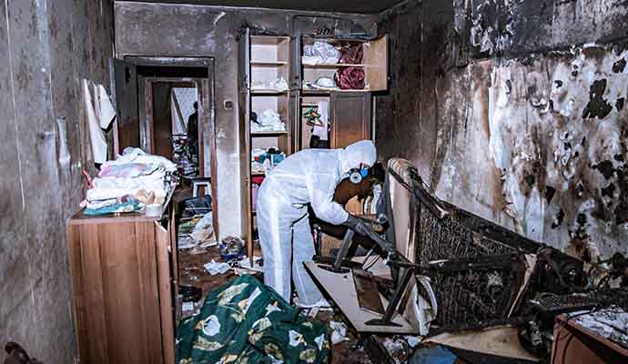 Expert cleaning fire damaged house.