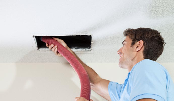 Professional duct cleaning using equipment