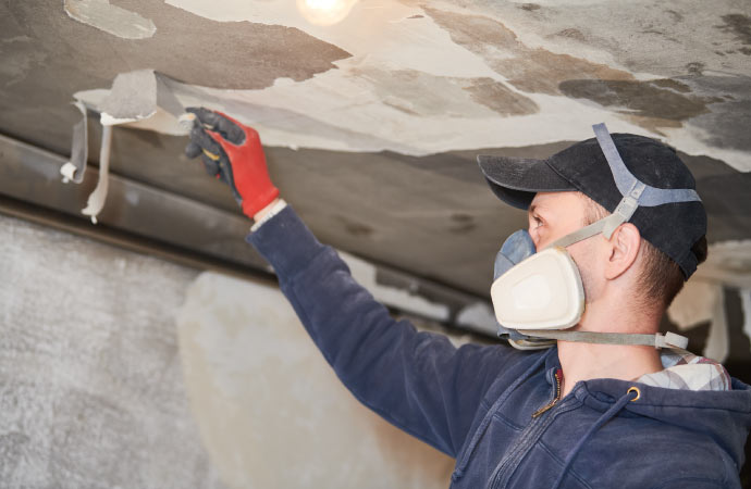 a professional worker restoring fire damage