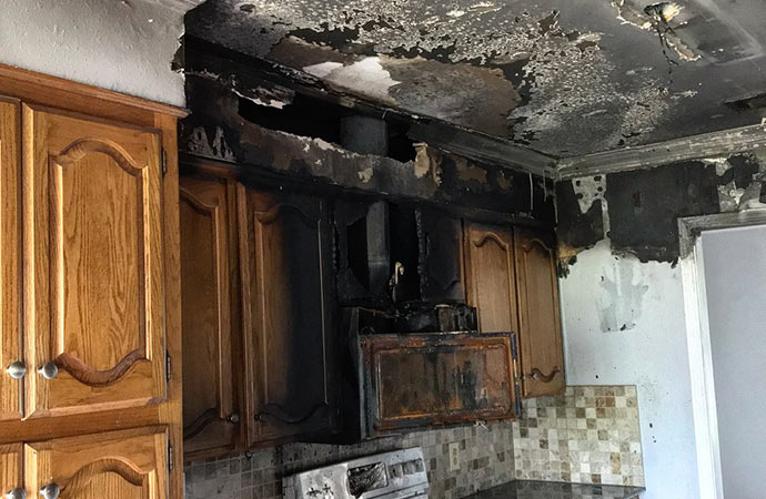 a kitchen damaged by fire