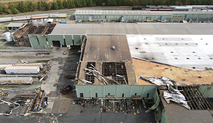 Aerial view of a storm damaged industrial building