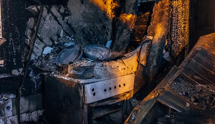 a kitchen damaged by fire