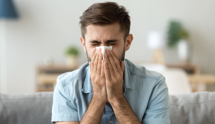 A person sneezing