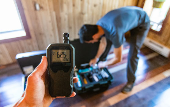 professional inspecting indoor air quality