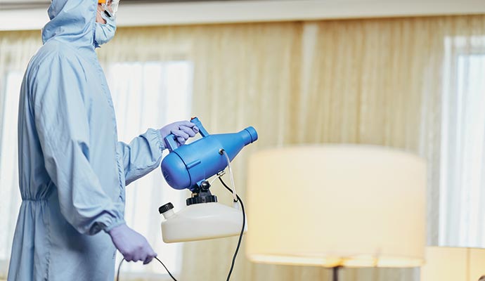 professional worker removing smoke