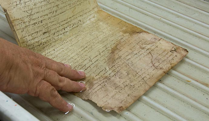 Restoring document from water.