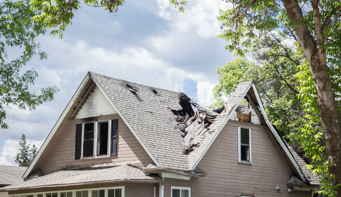 the roof is broken of a residential house