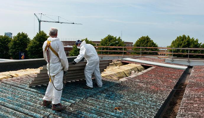 Professional team removing asbestos