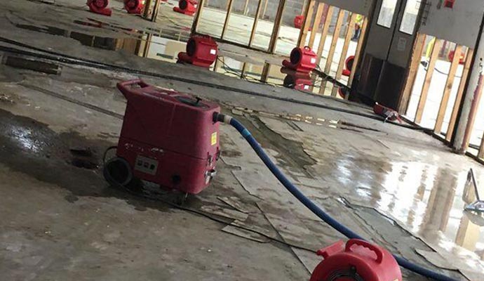 water damage restoration using equipments