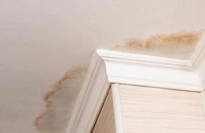 water stain on the ceiling of a room